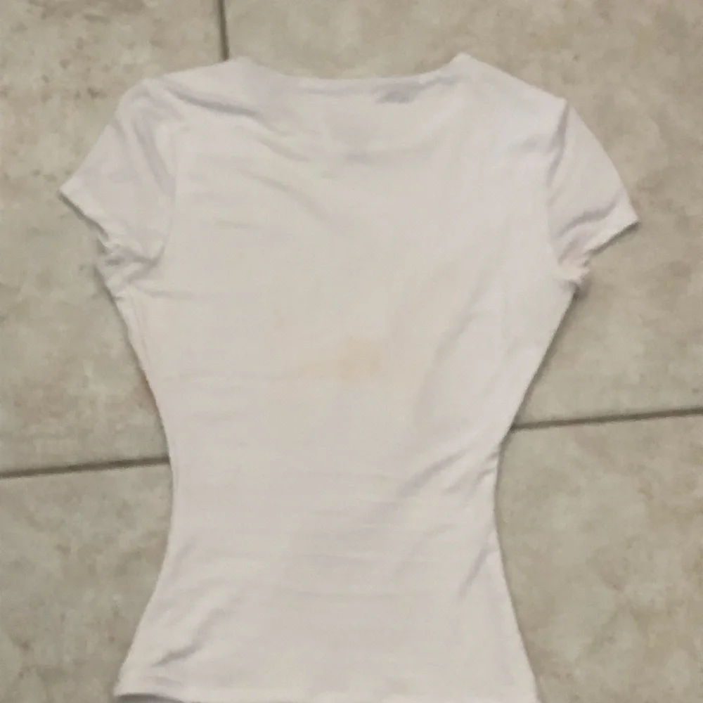 Faded Rose Women's White Tee with Orange Floral Design - Picture 2 of 3